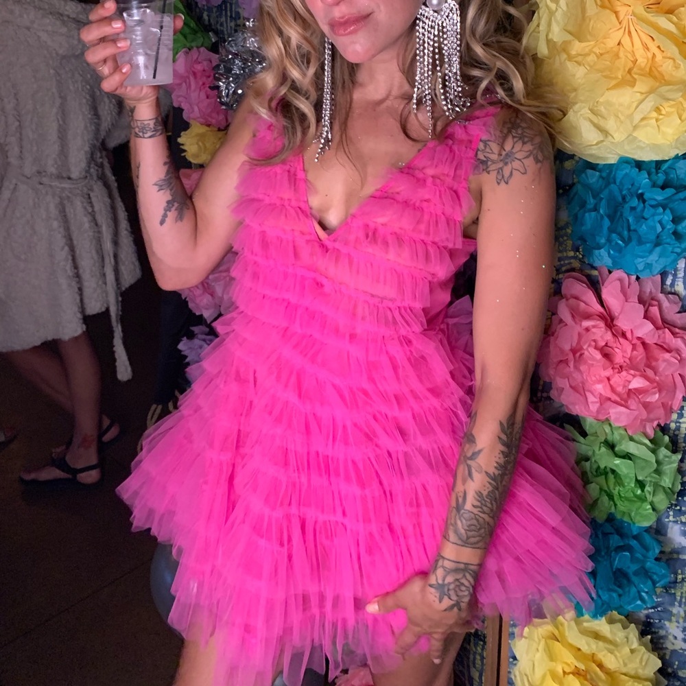 Kiki Riki New pink tiered ruffle plunging mini dress.